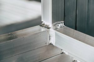 Aluminum square profiles welded in the frame in the production plant