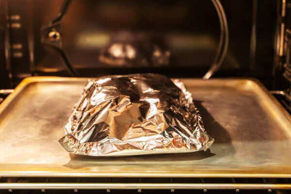 Is coated aluminum foil safe for oven use